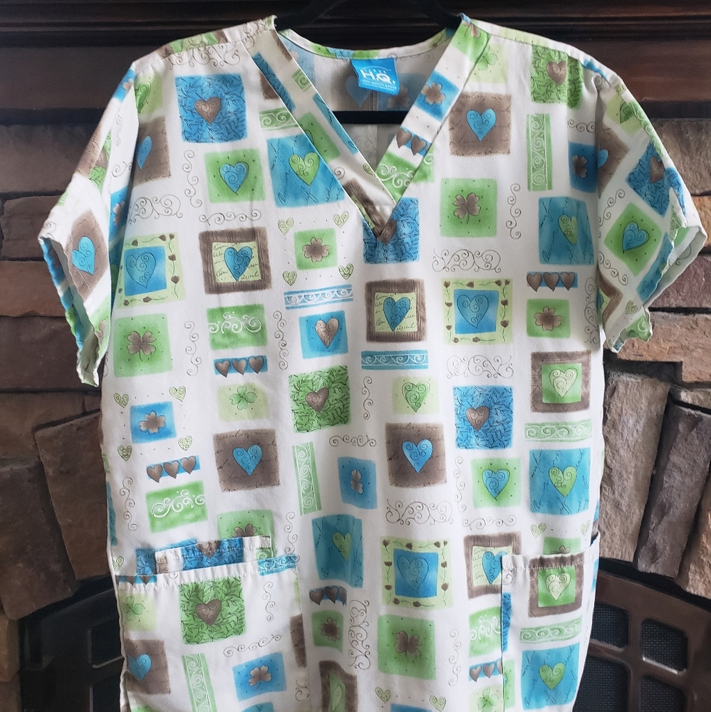 Scrub top. Size Med I believe. Size tag is missing